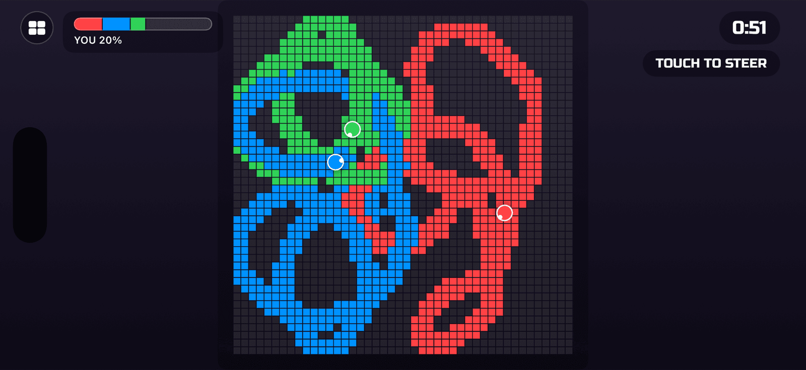 Turf War gameplay — three players painting the grid red, green and blue