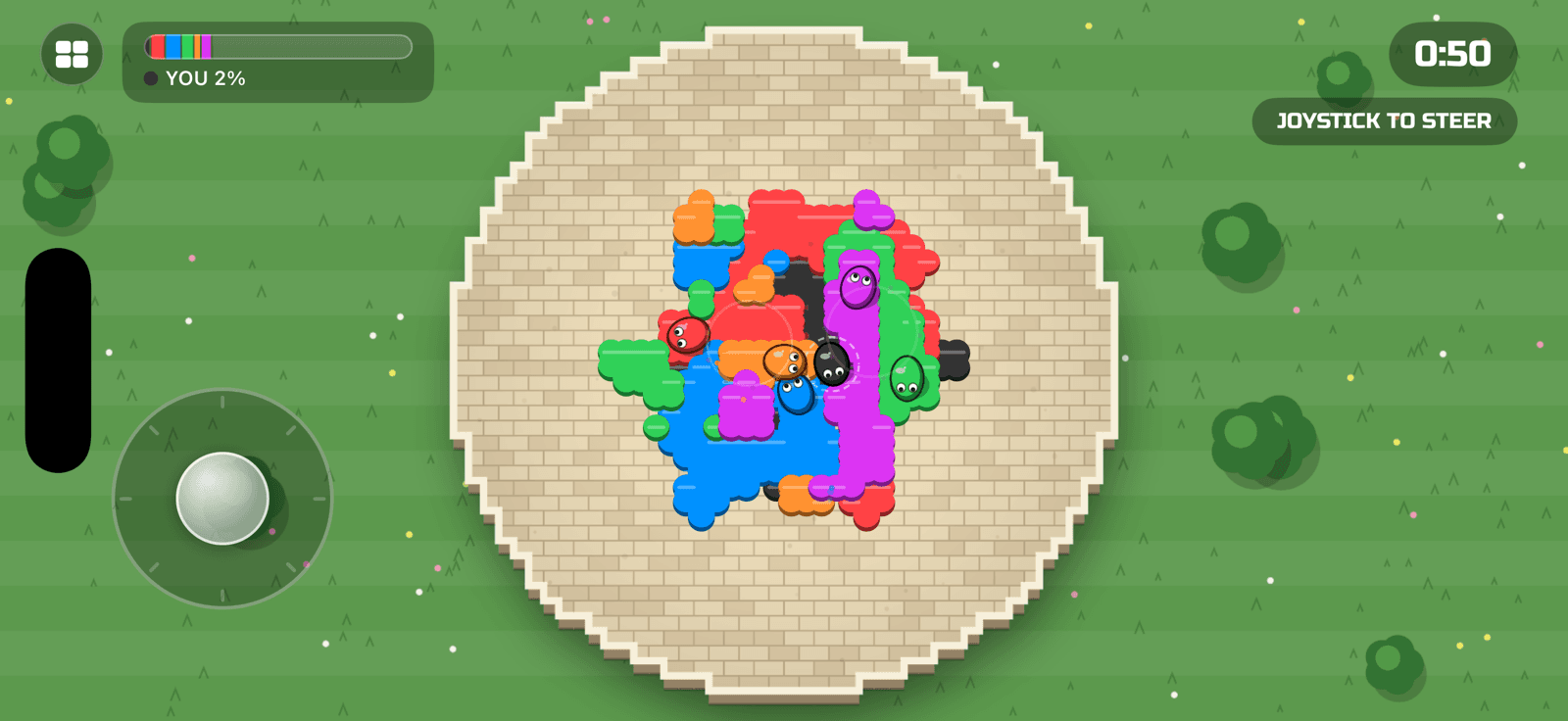 Turf War gameplay — six players painting a round floor in their colours